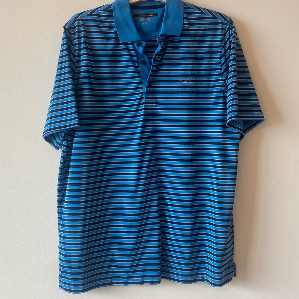 Greg Norman Polo, Blue Stripes. Size Large